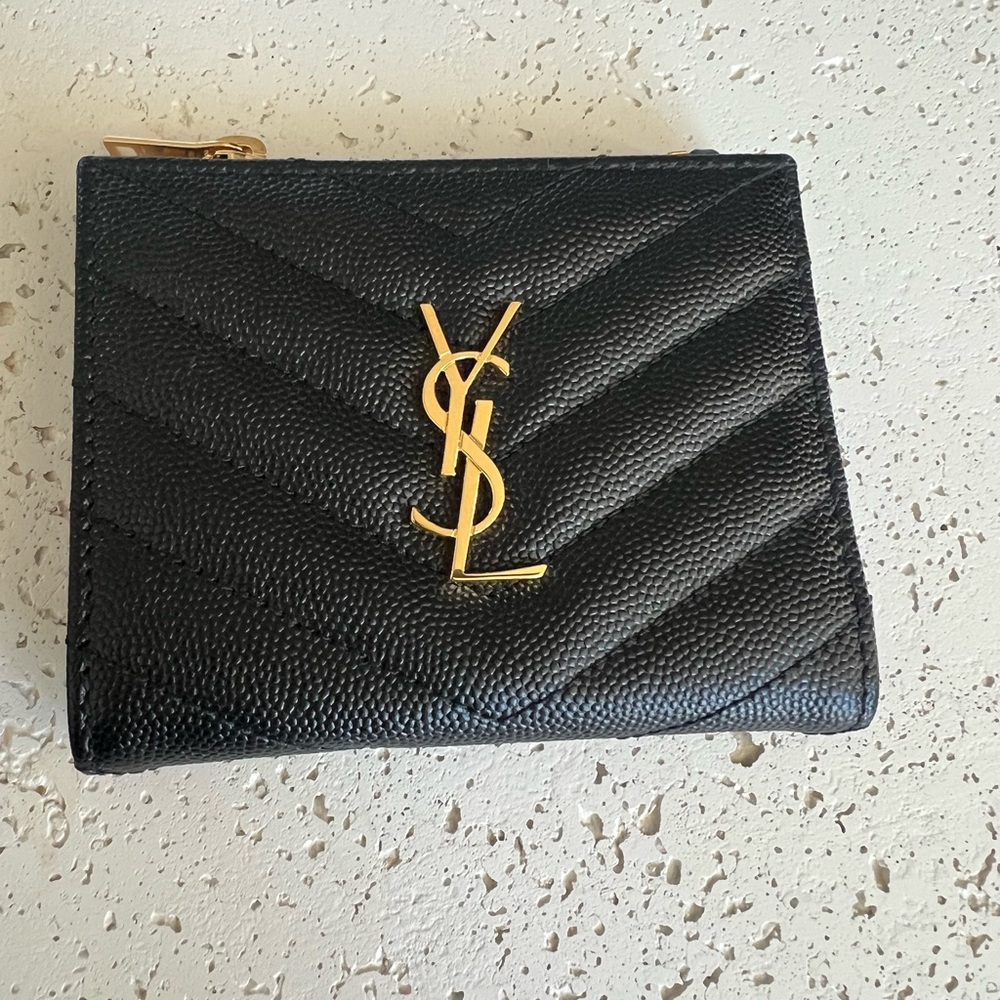 Black quilted wallet with all original packaging, dust bag, and authentication.